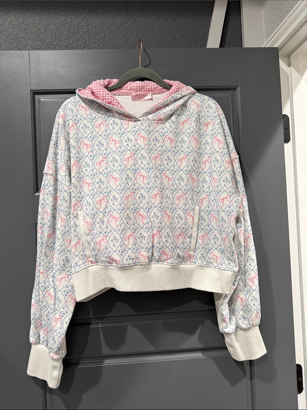 White & Pink Patterned Hooded Pullover Sweatshirt with matching ruffle shorts